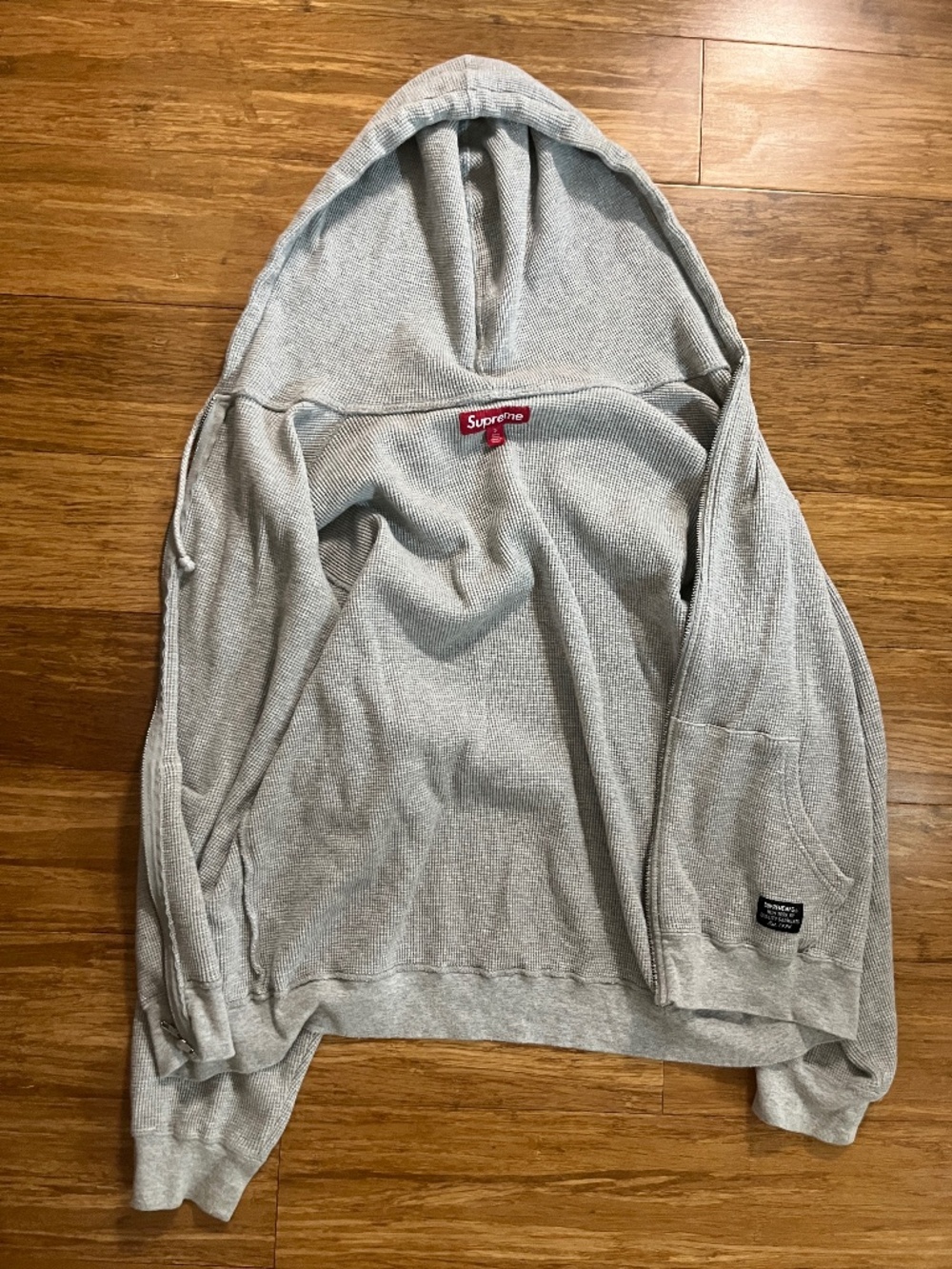 SUPREME COTTON WAFFLE ZIPUP WITH STRINGS AND TWO POCKETS